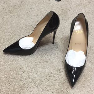 Never worn Louboutin black patent heels